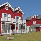 Die Häuser des Typus Muschel von außen. Sie sind alle von außen rot gefärbt.