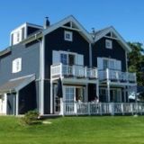 Die Häuser des Typus Muschel von außen. Sie sind alle von außen grau gefärbt.